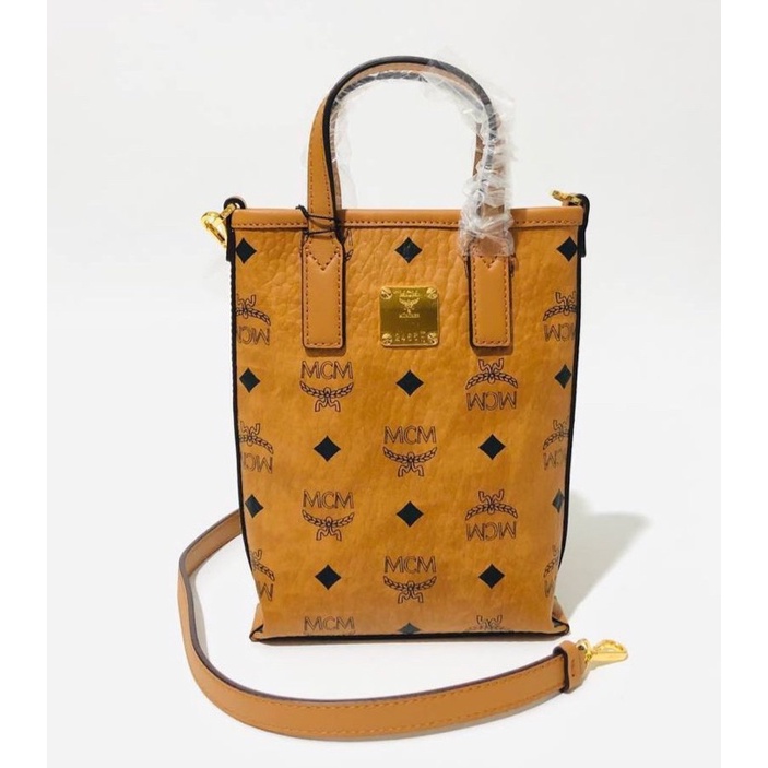 MCM Mini Essential Crossbody Bag in Cognac