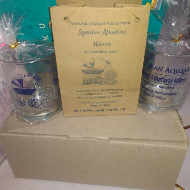 

Souvenir aqiqah gelas gagang bening,kemas paperbag