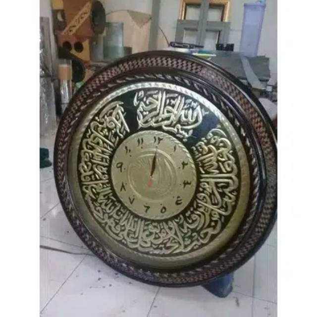 Jam kaligrafi emas mebel jepara