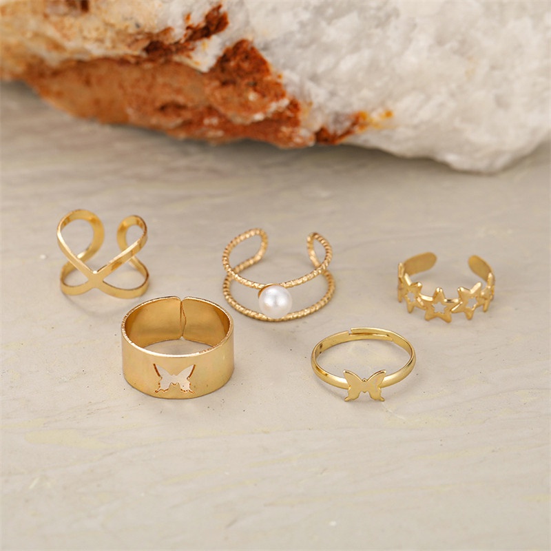 5pcs / Set Cincin Desain Kupu-Kupu Hollow Cross Aksen Mutiara Untuk Wanita