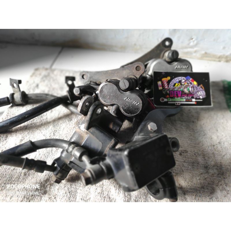 kaliper depan megapro/tiger revo