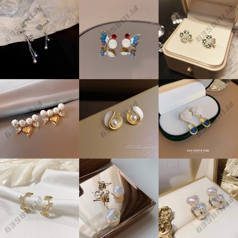 Anting-anting bunga fashion wanita Korea high-end berlian busur anting mutiara