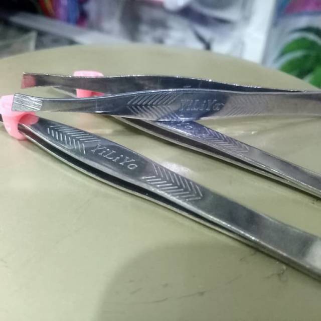 Pinset miring catut uban pinset alis miring stainless