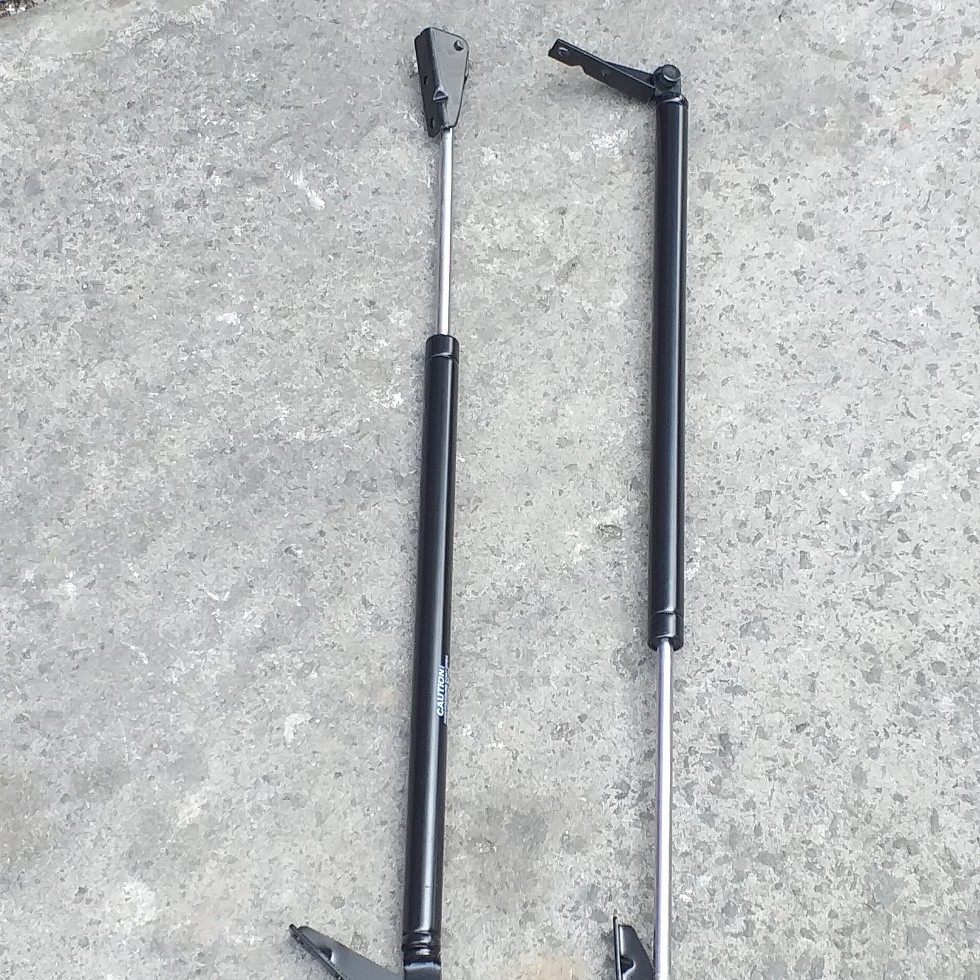 Shock bagasi belakang Luxio