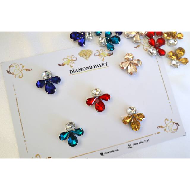 Payet rangkai cangkang hiasan baju kupu