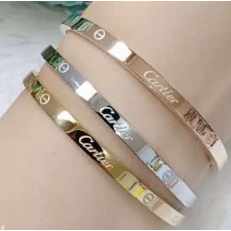 Gelang titanium 100% ori 1set terdapat 3 warna ukuran 5,5-6cm