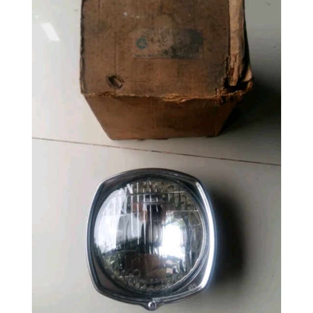 reflektor lampu depan yamaha V75 original nos.