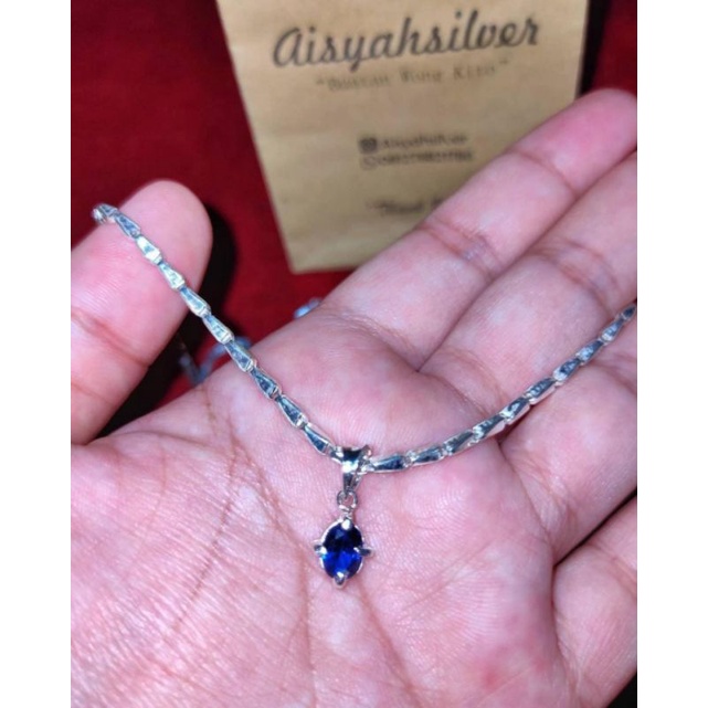 kalung padi liontin mata biru