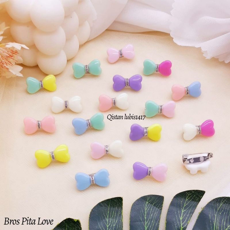 Tersedia Bros manik pita love cantik/1 pcs