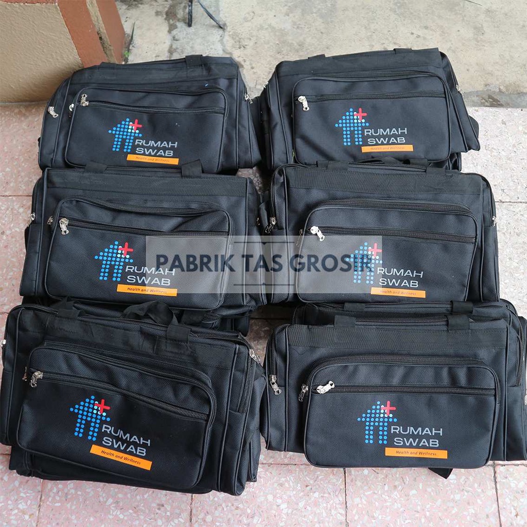 PESANAN GROSIR TAS TRAVEL SABLON RUMAH SWAB SEMINAR SOUVENIR PROMOSI MULTIFUNGSI HARGA EKONOMIS