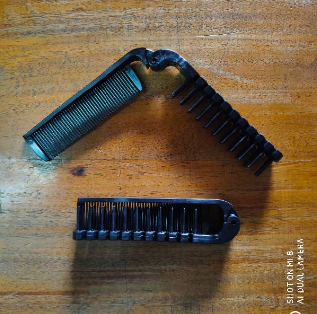 Sisir lipat hitam