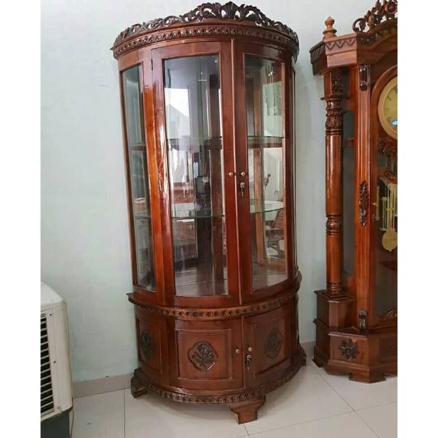 Lemari hias jati setengah lingkar