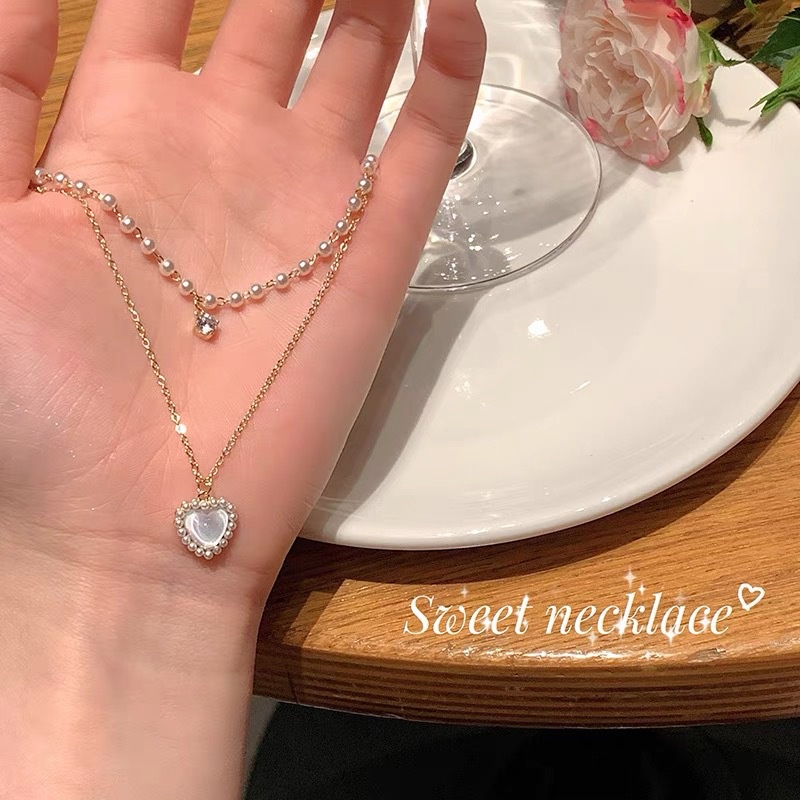 Kalung Rantai Klavikula Dengan Liontin Hati Ganda Aksen Mutiara Untuk Wanita