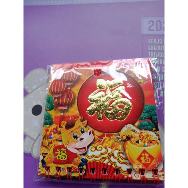 

kalender mini motif shiu kebo
