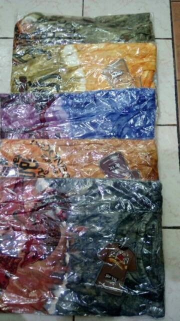 TerLaris Kaos Katun Bali Motif Campur Ukuran Dewasa