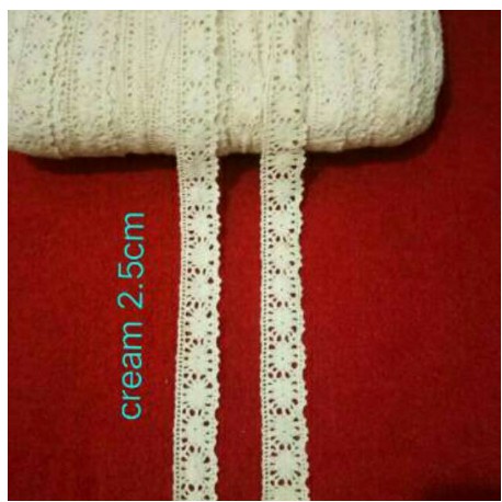 

Renda rajut cream 2.2cm - 2.5cm, roll panjang 15yard (13.5 meter)