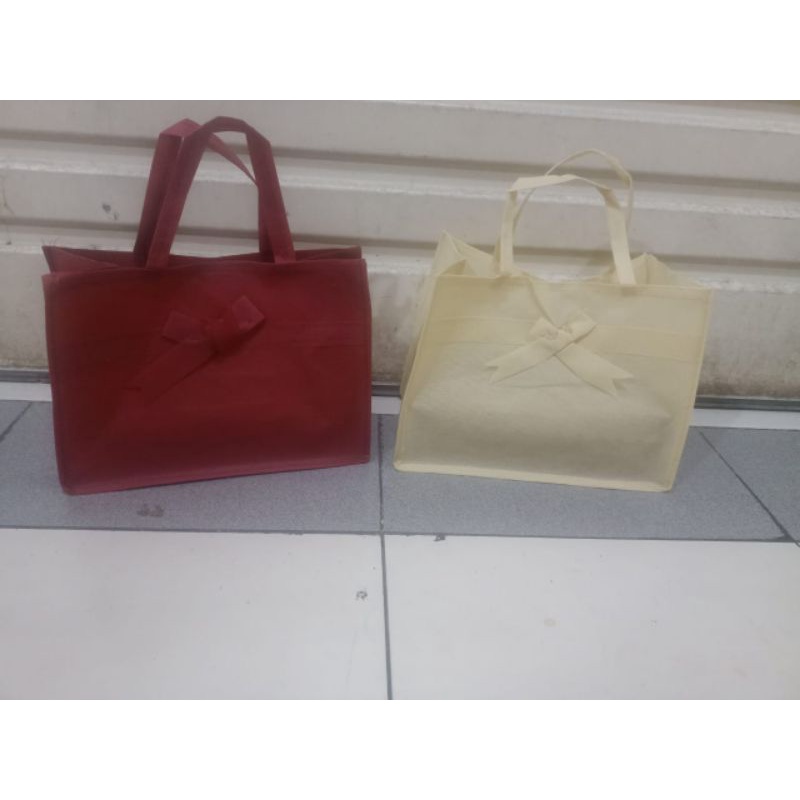 

tas kain spunbond bronis ukuran 25 isi 12 pcs terlaris dan termurah