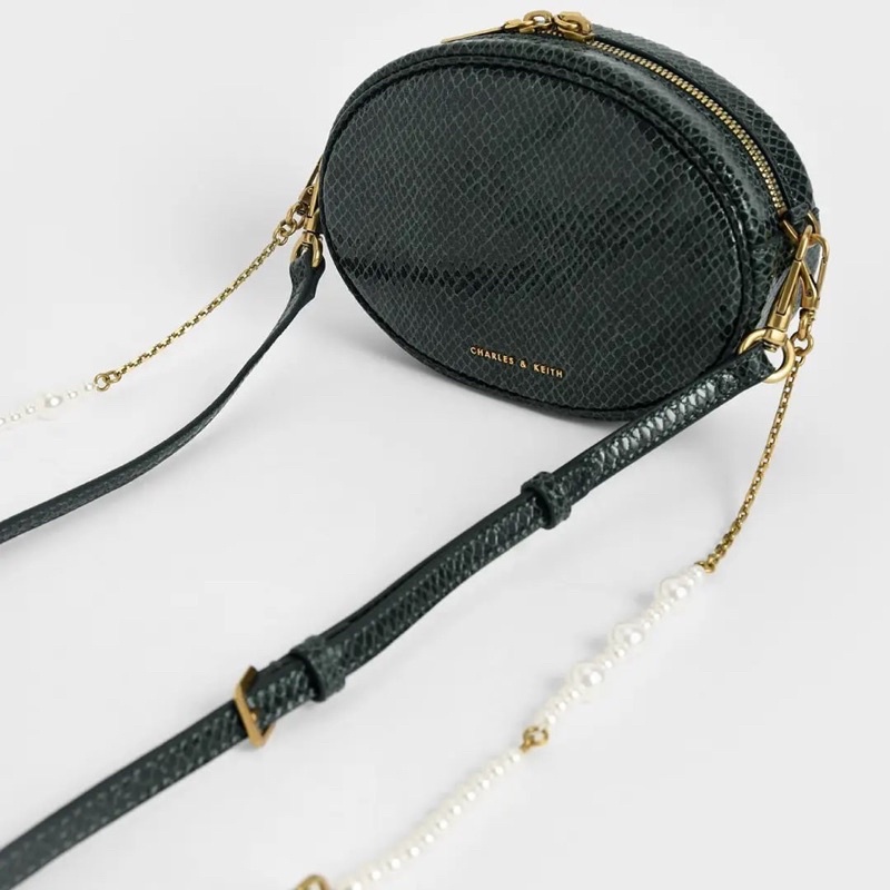 Chain Embellished Oval Crossbody Bag