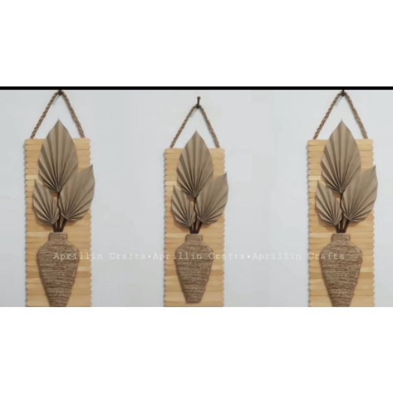 Hiasan dinding daun palem kering