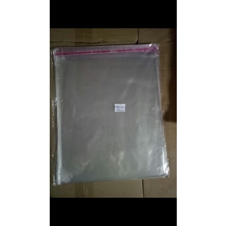 

PLASTIK OPP UKURAN: 28X35 KEMASAN PACKING BAJU BENING BAJU SEAL