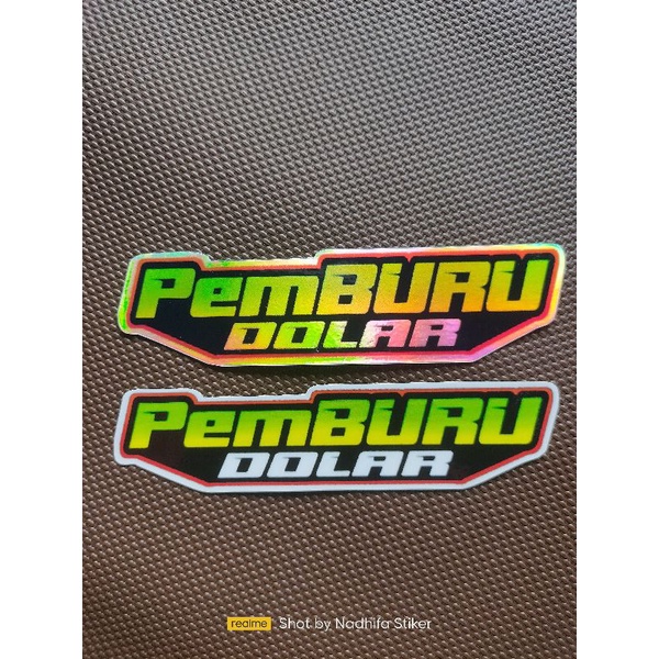 

stiker hologram tulisan "Pemburu dolar