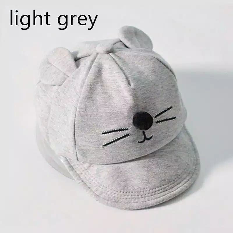 TOPI LOKAL TELINGA KUCING