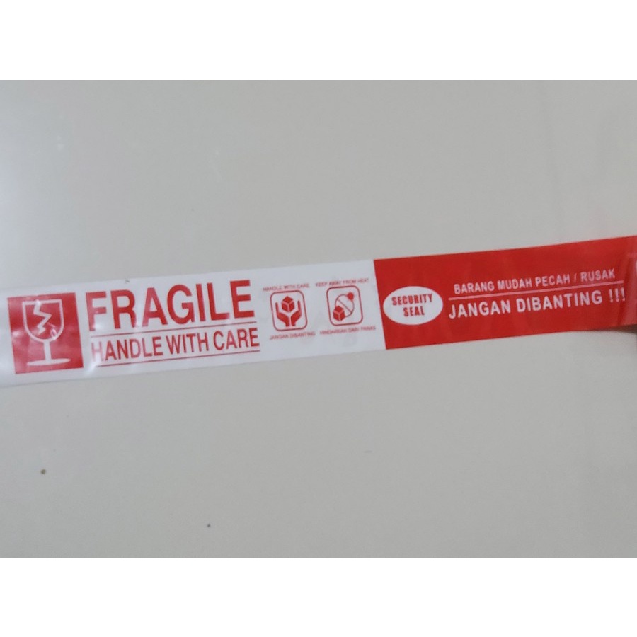 

lakban fragile merah putih Merk HP TAPE 45mm x 100 yard 2 in 1