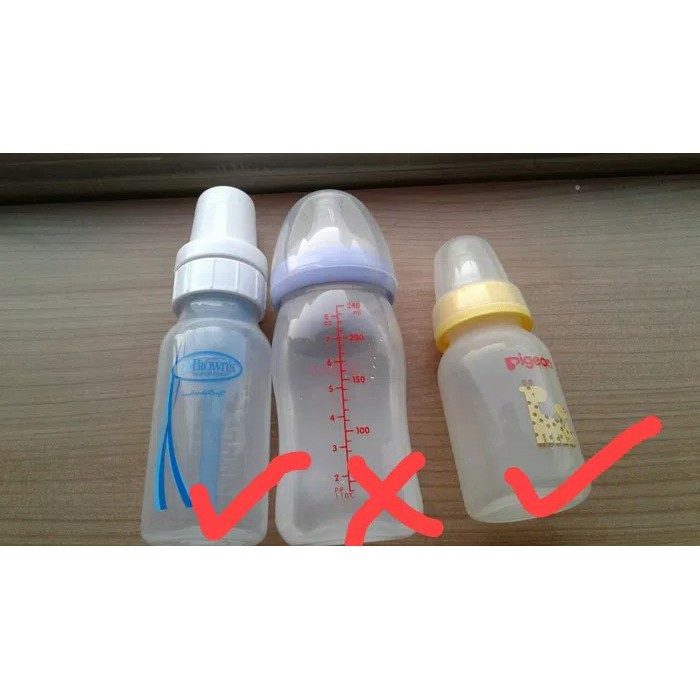 Sarung Cover Alas Pelindung Botol Susu Anak Bayi Model Boneka ( Baby Bottle Doll Cap )