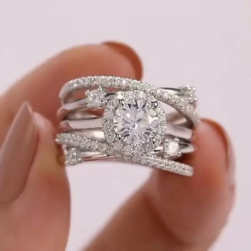 Cincin Wanita Model Silang Lebar Hias Cubic Zirconia Bling Warna Silver Untuk Pesta