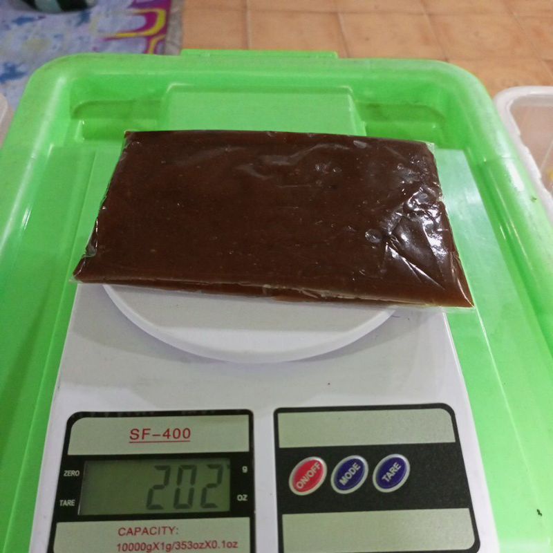 

Dodol asli Kandangan berat -+200gram produksi ibu Noor jannah