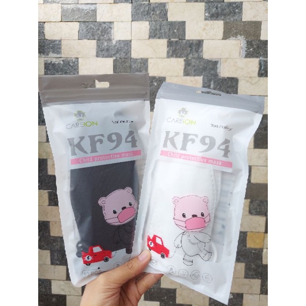 MASKER KF94 CAREION ANAK MERK CAREION KIDS POLOS 4PLY HITAM DAN PUTIH 3-12 TH - ISI 10 PC