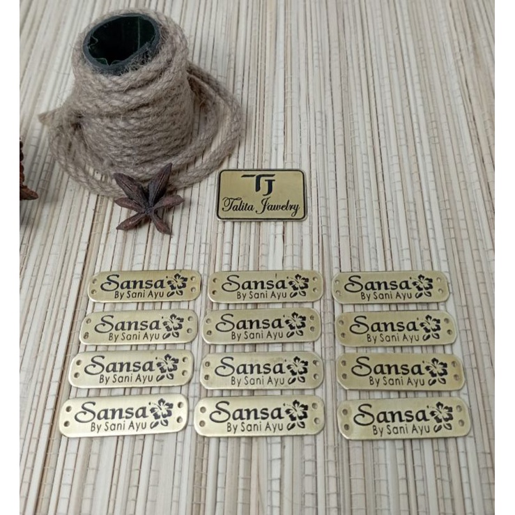 min 50, label baju ,label plat hijab logam