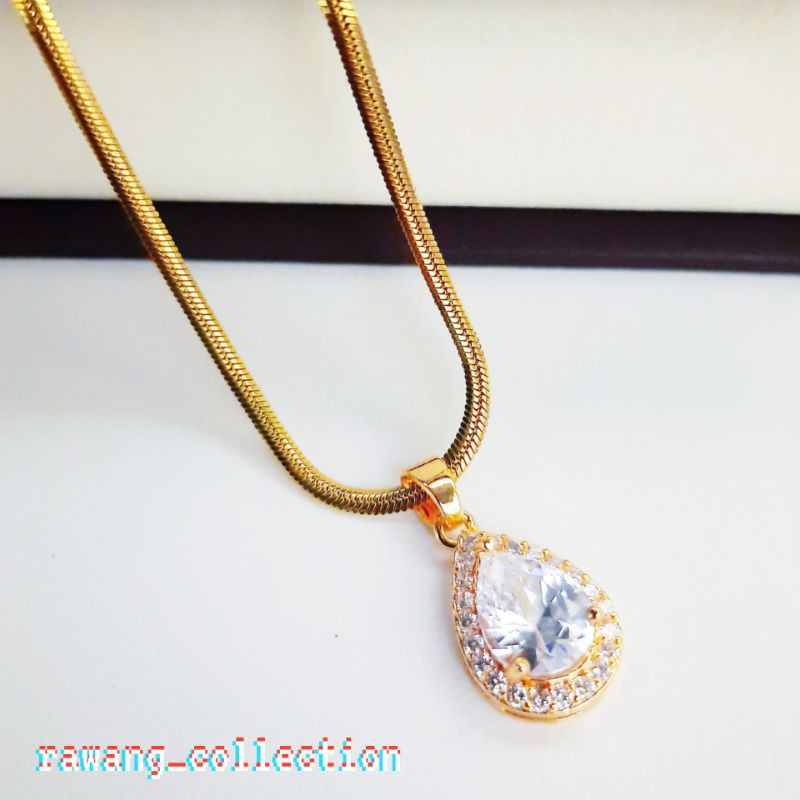 kalung titanium gold belut plus liontin permata putih