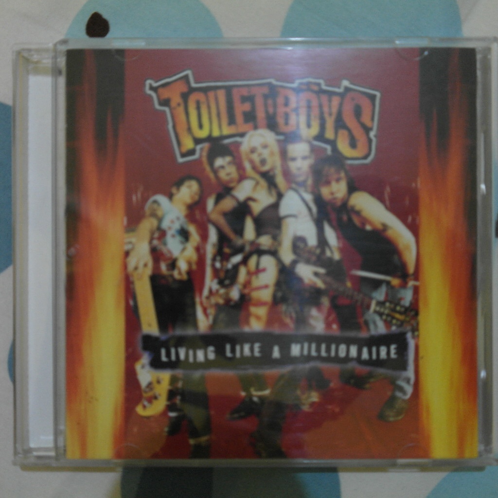 CD TOILET BOYS - LIVING LIKE A MILLIONAIRE