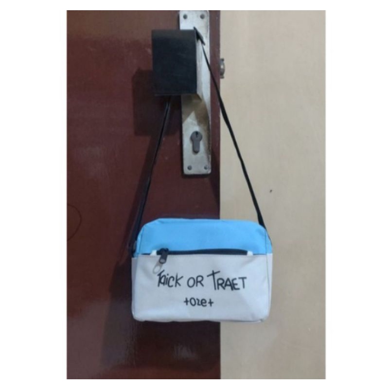 TAS SLING BAG MINI TRICK AND TREAT