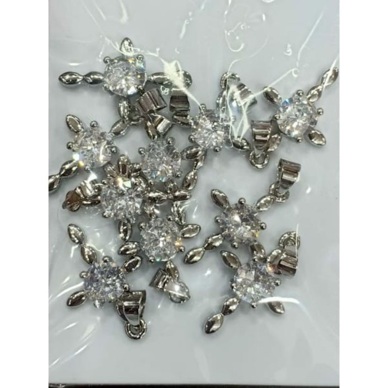 Liontin salib harga/pack isi 10pcs 1motif