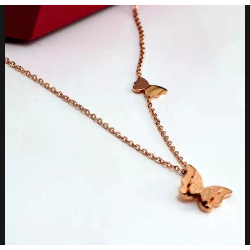 KALUNG TITANIUM LIONTIN KUPU KUPU DABEL WANITA