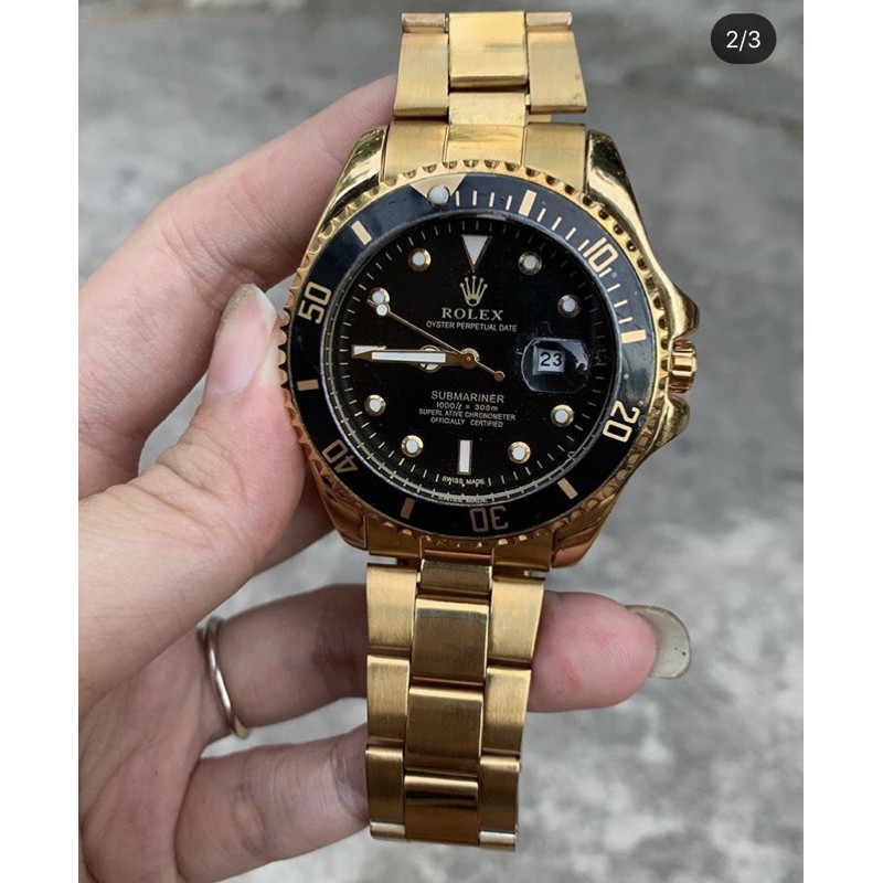 rolex submarine gold black