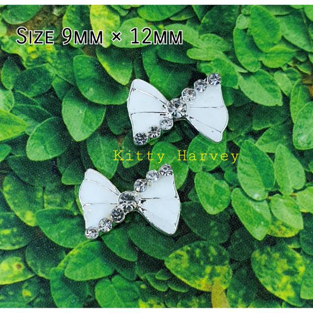 Charm Nail Pita Putih 013