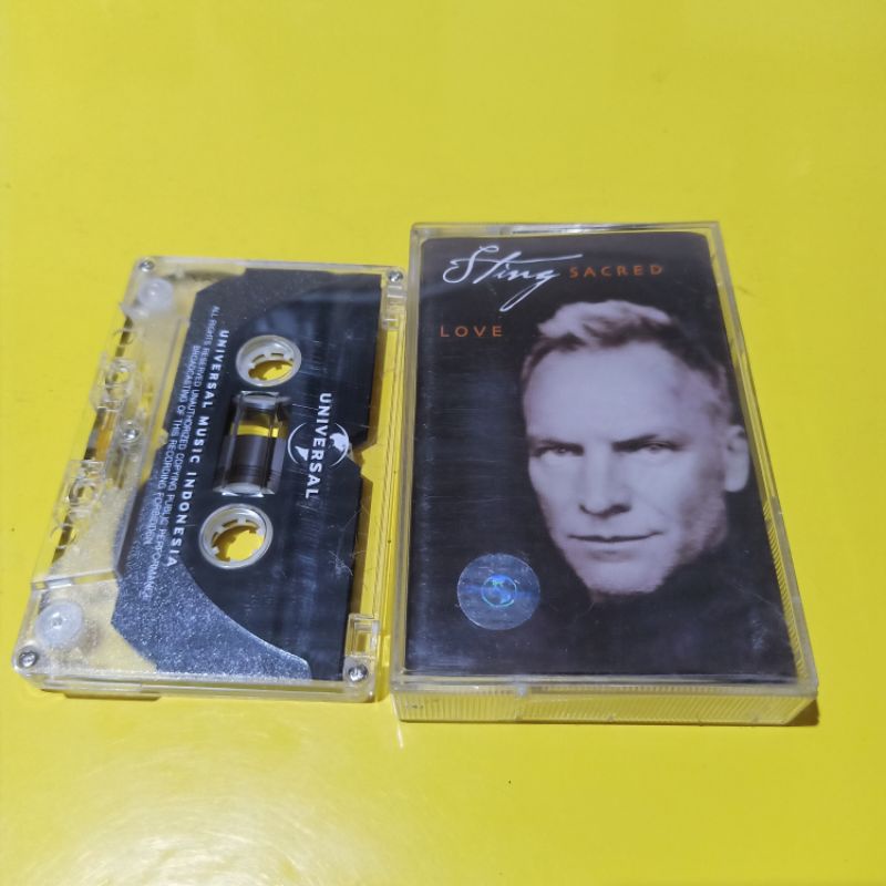 Kaset STING Sacred Love
