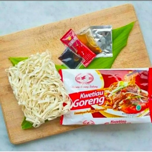 

Kwetiau Goreng Instan Cap Burung Layang Terbang