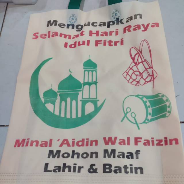

(38*45,)tas kain spunbond lebaran new isi 12 pcs terlaris dan termurah