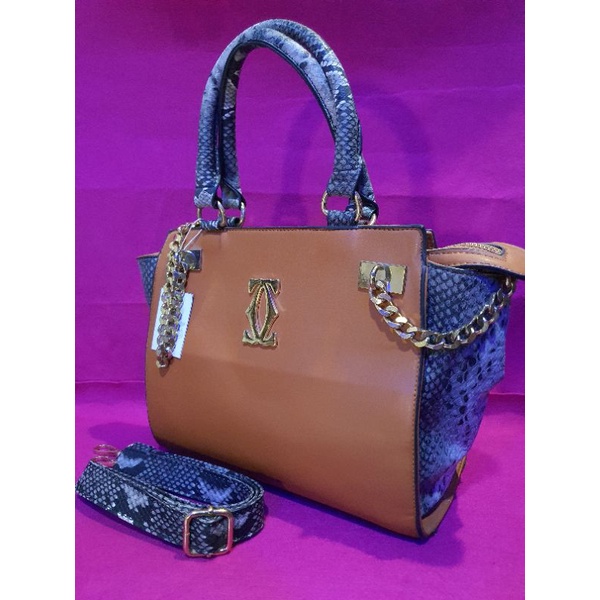 cartier bag motif mix kulit Ular