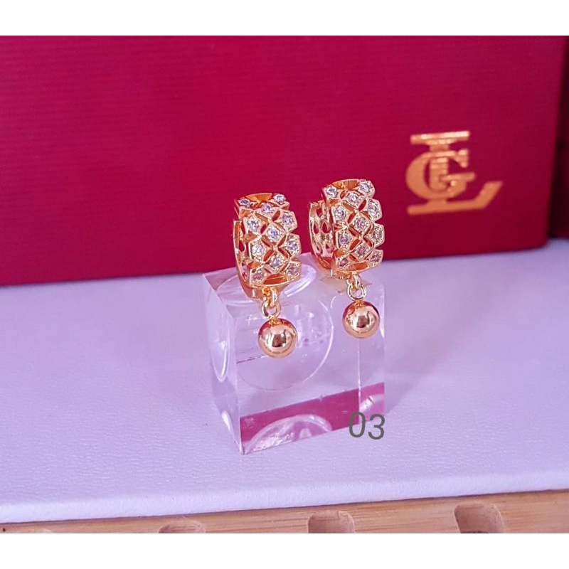 Anting titanium import kode 15 dan salib,awet,tahan lama