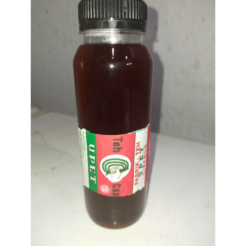 

Syrup Kental Manis Teh Upet Khas Cirebon Kemasan Botol Berat 400 Gram