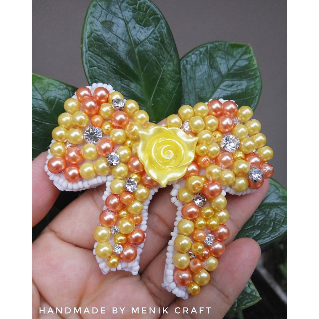 

Brooch Pita Orange