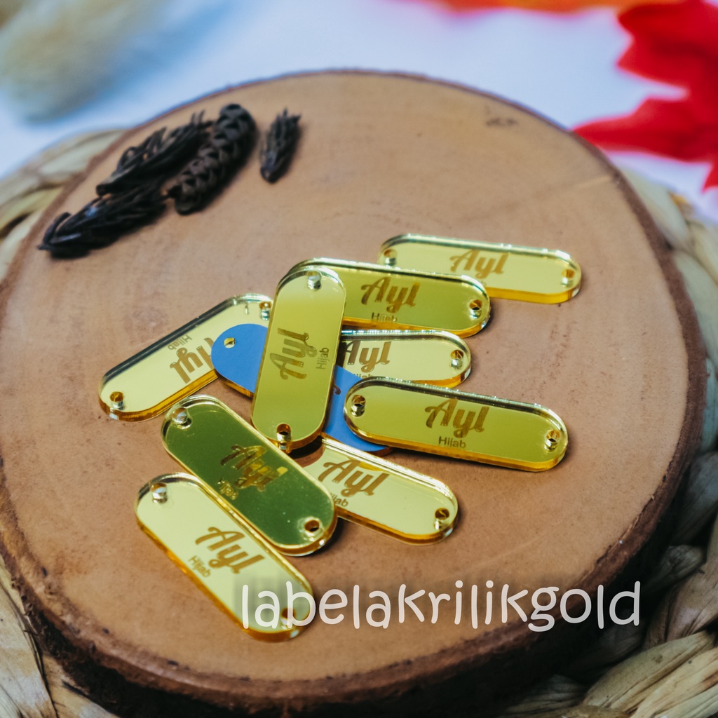 

label hijab | label baju | label akrilik | custom label | label jilbab | label cutting | label koko