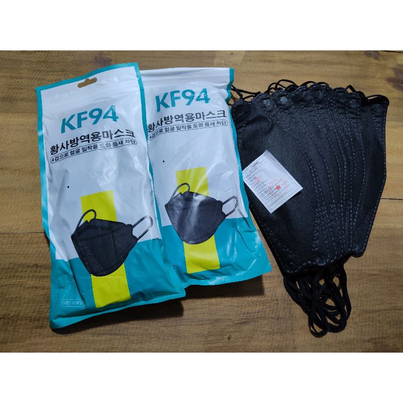 masker Kf94 black 4ply isi 10