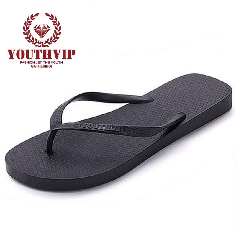 white and clear puma slides