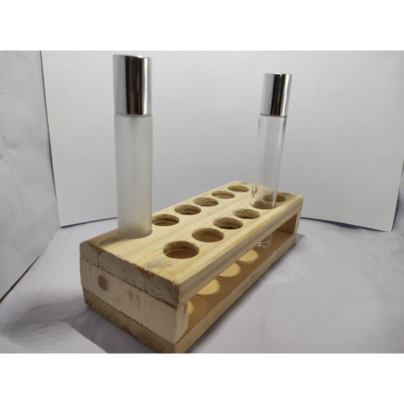 Rak botol parfum lilin